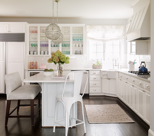 L shaped kitchen with island. White L shaped kitchen with island. Island Pendant Lighting is a pair of Currey & Co Roundabout Pendants. #Lshapedkitchen #WhiteLshapedkitchen