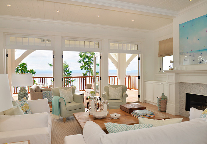 Living Room. Coastal living room, pillows, texture, light colors, white oak floors, and turquoise and seafoam decor. Sunshine Coast Home Design.