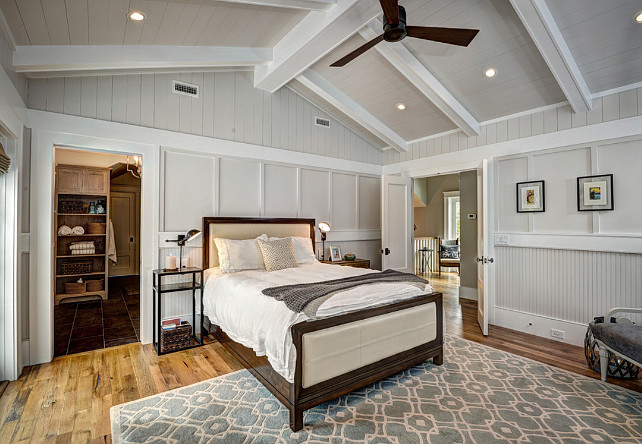 Master Bedroom Layout. Beadboard. Board and batten. Double doors. Hardwood floors. Master bedroom. Peaked ceiling. Tongue and groove. Vertical shiplap. White beams. White trim. Wood walls