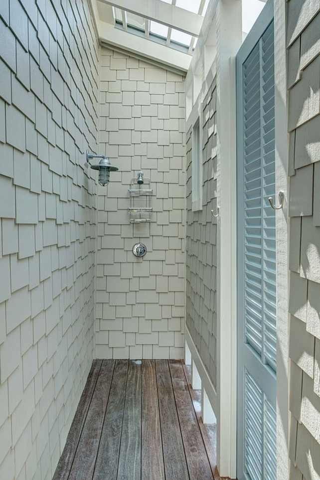 Outdoor Shoyer. Beach House outdoor shower. Beach house with outdoor shower with shingles, ipe flooring and a turquoise shutter-style door. #OutdoorShower Christ & Associates.