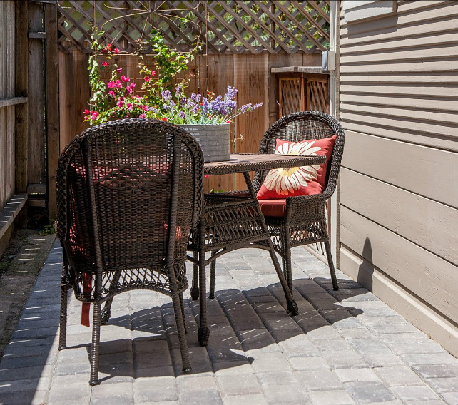 Patio Decorating Ideas. You really don't have to have a big patio to make it feel beautiful and inviting. Bring some flowers and comfortable patio furniture to make the best of your small patio! #Patio #PatioDecor #PatioIdeas