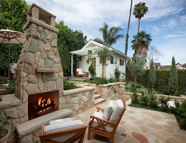 Patio Fireplace. Stone patio fireplace. Outdoor fireplace. Backyard fireplace. #Fireplace #Patio #Outdoor #Backyard Via Sotheby's Homes.