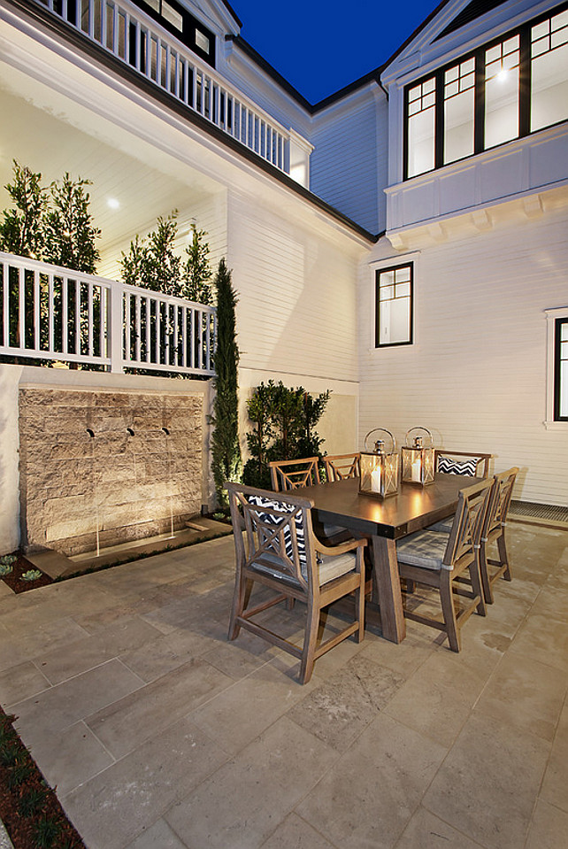 Patio with garden water features. Patio outdoor dining. #patio Spinnaker Development.