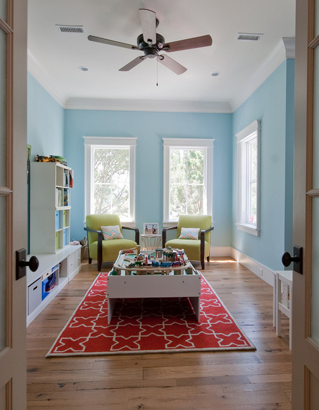 Playroom. Andersen windows. Blue Room Paint Color. Kids playroom. Red rug. Wood floors