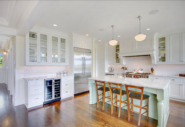 Kitchen with pale green island. Island Paint Color is Benjamin Moore Spring Sky 674. Beautiuful white kitchen with pale green island. #Kitchen #KitchenIsland #PaleGreen