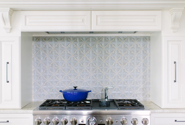 Range Backsplash. Off-white kitchen canbinet with blue range backsplash. #Kitchen #Backsplash #BlueBacksplash Kate Marker Interiors.
