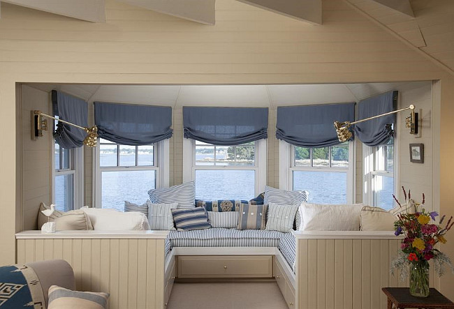 Reading Nook. This reading nook with window seat is tucked away in this home office. Christie's Real Estate.