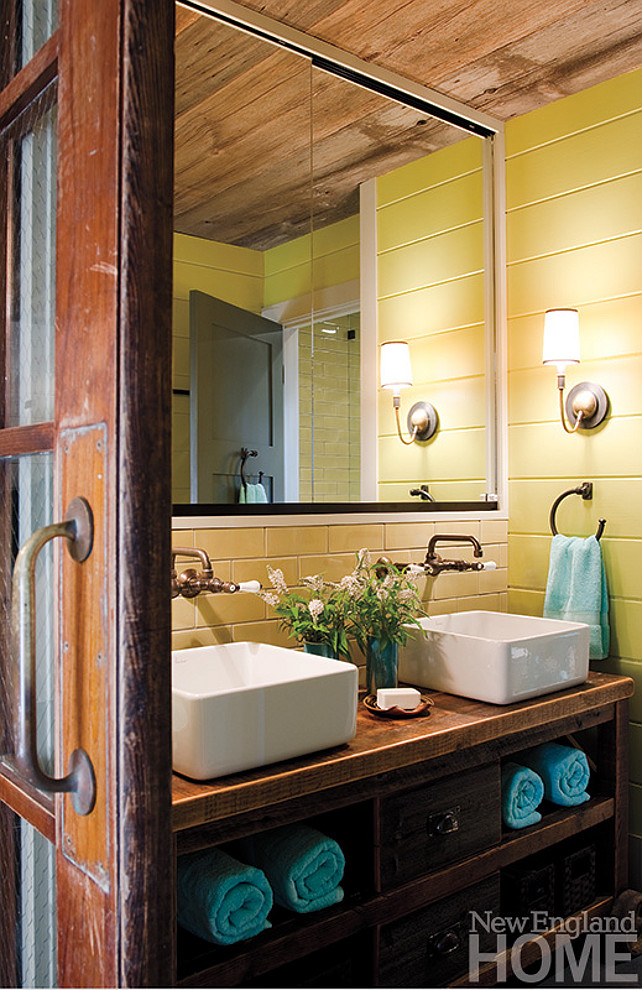 Reclaimed Wood. Bathroom Reclaimed Wood Ideas. The kids’ bathroom closes with a sliding barn door outfitted with glass panes that sandwich chicken wire. #Bathroom #ReclaimedWood
