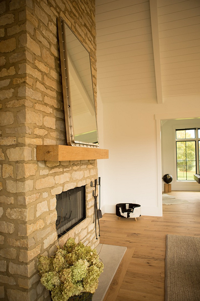 Rustic Stone Fireplace with timber mantel. Floor-to-ceiling Rustic Stone Fireplace with timber mantel. #Fireplace #Rustic #Stone #Timber #Mantel Hahn Builders.