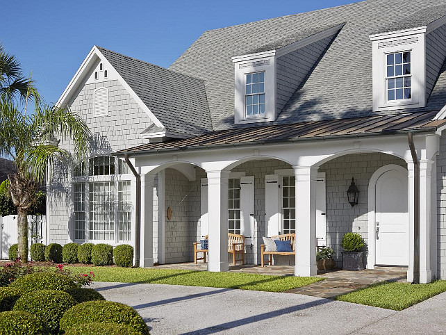 Shingle Home. Gray Shingle Home with front porch. #ShingleHomes #GrayShinglePaintColor #ShinglePaintColor #ShingleHomeIdeas #FrontPorch #porch Via HGTV.