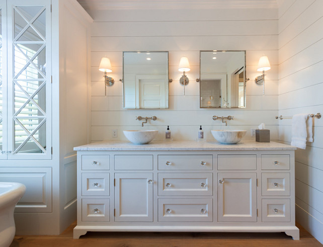 Shiplap bathroom. How to Use Shiplap in the Bathroom: The material used for the walls is a 1x8 poplar ship lap that was pre-primed on all faces before installing. You do this for two reasons. First, to help reduce moisture absorption during the humid part of the year which in turn keeps the wood more stable. Second, so when the boards are installed and gaped to 1/8" between each board, you won't see the raw wood. Shiplap bathroom ideas. White Shiplap bathroom. The Shiplap wood in this bathroom is painted in White Dove by Benjamin Moore. #Shiplapbathroom #Shiplap #Bathroom #BenjaminMooreWhiteDove