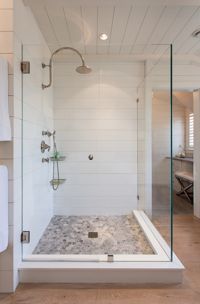 Top Shower Tiling Pin Shower Tiling. Shower Tiling. Bathroom Shower Tiling. The tiling in this shower is 1/2" Corian sheet which were fabricated with an" 1/8 wide cut 1/4" deep every 7 1/2" horizontally. The tilies mimic the shiplap walls in the bathroom. #Shower #tiling #corian #shiplap