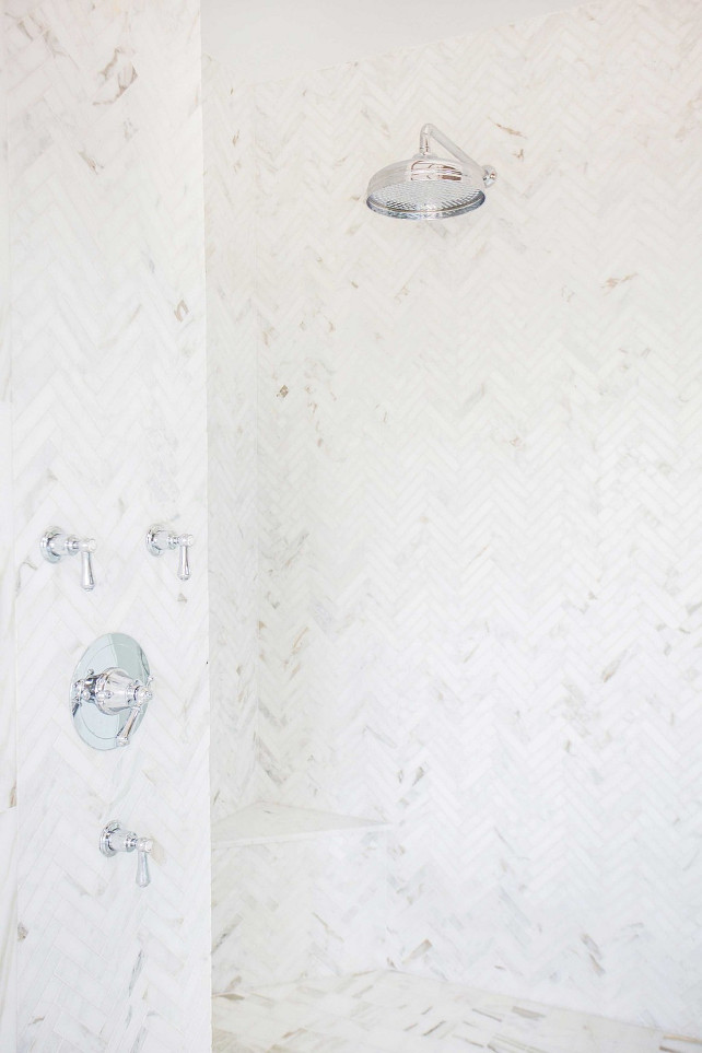 Shower Tiling. Bathroom shower tiling. The shower tiling is marble set in a herringbone pattern. #Shower #Bathroom #Tiling #Herringbone #Marble #ShowerTiling Blackband Design.