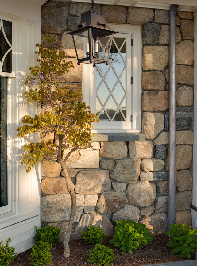 Stone Home Exterior Ideas. Rounded granite fieldstones Significant Homes LLC