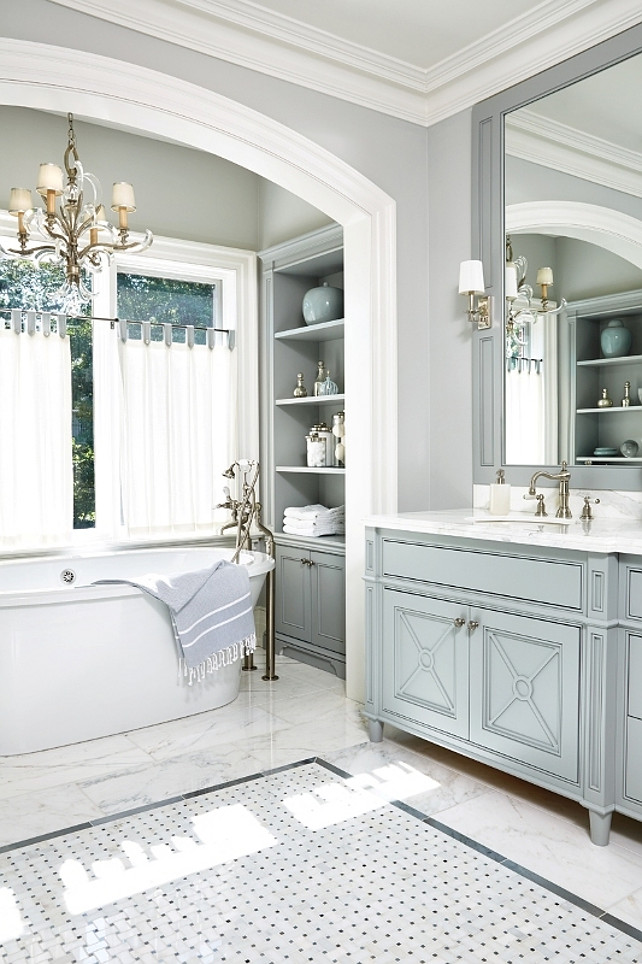 Traditional Bathroom. Traditional Bathroom with blue gray cabinet, gray walls, marble flooring and alcove bath. #TraditionalBathroom Anne Hepfer Designs.