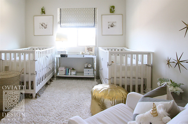 Twin Nursery. Neutral gender twin nursery. Neutral gender twin nursery with gray, white and gold decor. #nursery #twin #TwinNursery #NeutraLgengerNursery Oviatt Design Group.