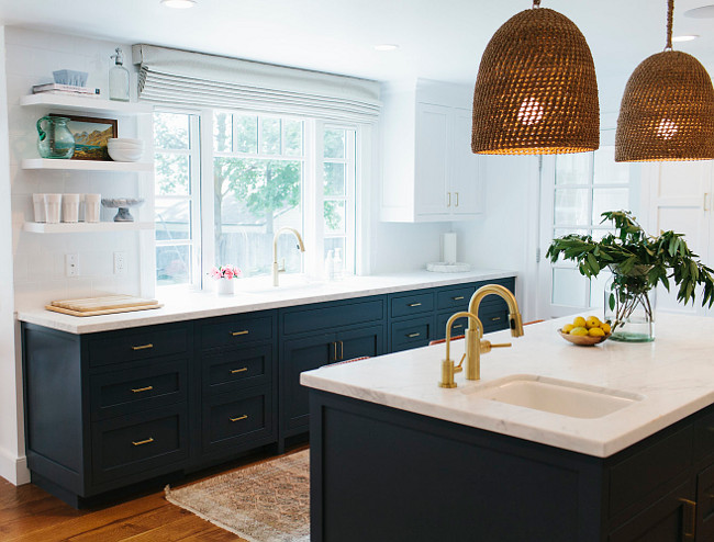 Two toned kitchen. Two toned kitchen painted in white and navy. Two toned kitchen with white upper cabinets and navy lower cabinets. #Twotonedkitchen #cabinets Studio McGee.