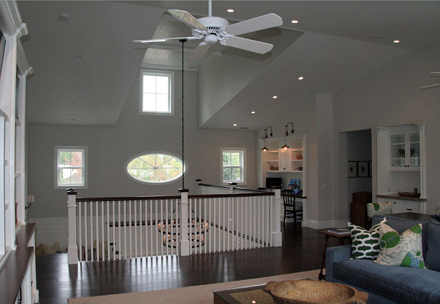 Upper landing area. Upper landing area with family room, reading area, built-in desk. Toblesky-Green Architects.