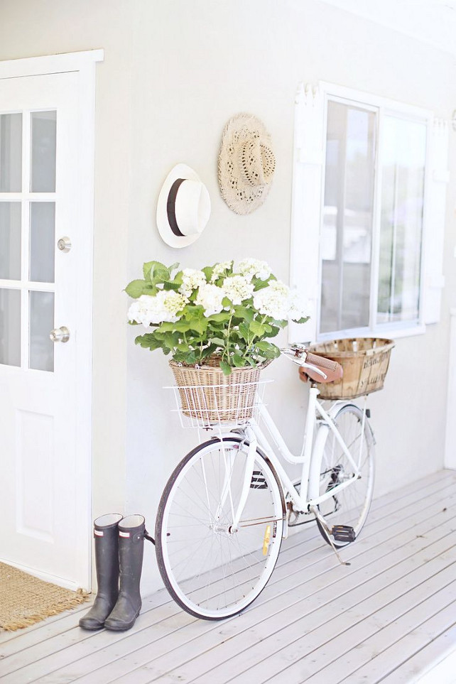 beach Porch with Vintage Bike with Flower Basket. Via Beach Decor Blog.