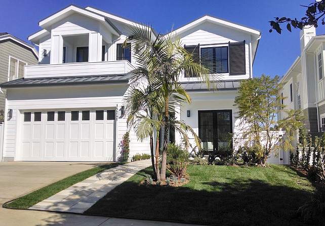 White Home Exterior Ideas. Modern White Home Exterior with Dark Gray (Charcoal) Shutters. #WhiteExterior #WhiteHouseExterior #WhiteHomeExterior #Shuuters #DarkrGray #CharcoalShutters White Picket Fence, Inc.