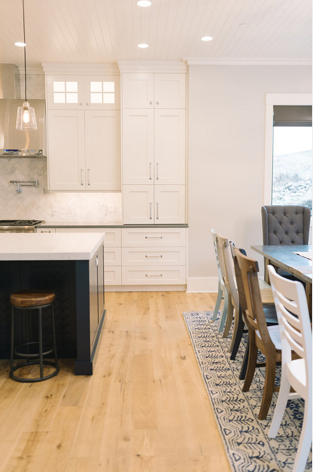 White Kitchen with Wide Plank Floors. White Kitchen wide plank hardwood flooring. #KitchenWideplankHardwood #KitchenWideplankHardwoodFlooring #WhiteKitchenWideplankHardwood Four Chairs Furniture.