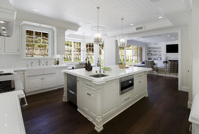 White Kitchen. White Kitchen Cabinet. White Kitchen with White Kitchen Island. White KItchen with marble countertop. White Kitchen with beadboard ceiling. #WhiteKitchen #WhiteKitchenCabinet #WhiteKitchenMarbleCountertop #WhiteKitchenBeadboardCeiling Dtm Interiors.
