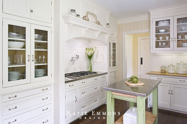White kitchen with custom cabinets and portable kitchen island. #kitchen #portableisland #portablekitchenisland
