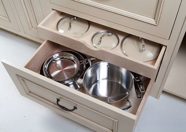 Kitchen cabinet storage. Great kitchen cabinet storage ideas for pans. #KitchenStorage #KitchenStorageSolutions