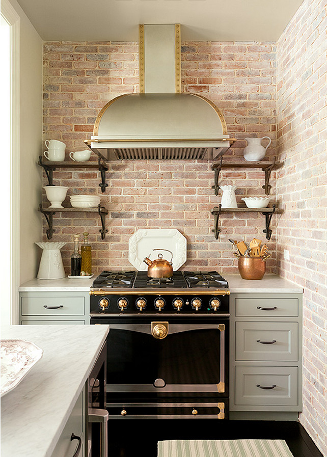 Stove nook kitchen nook exposed brick walls kitchen exposed brick walls exposed brick kitchen walls dome kitchen hood stainless steel kitchen hood brass trim dome kitchen hood brass trim stainless steel dome kitchen hood brass trim rustic kitchen shelves french stove black and gold stove black and gold french stove gray cabinets grey kitchen cabinets.