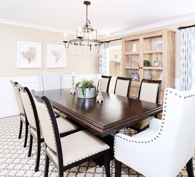 Dining Room. Mix of wood in dining room furniture. #interiors #interiordecor #interiordesign #homedecor #homedesign #interiordecoration #decor #decorate #homesweethome #reclaimedwood #nailheadtrim #chandelier #coastal #coastaldecor #interiordesignideas #inspiration Blackband Design.