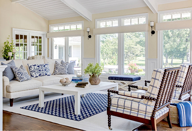 Living room. Blue and white living room. living room with arm chairs, blue and white, blue bench, cathedral ceiling, ceiling design, dark wood floors, neutral colors, open concept, open floor plan, slanted ceiling, stanton rug Kim E Courtney Interiors & Design Inc.