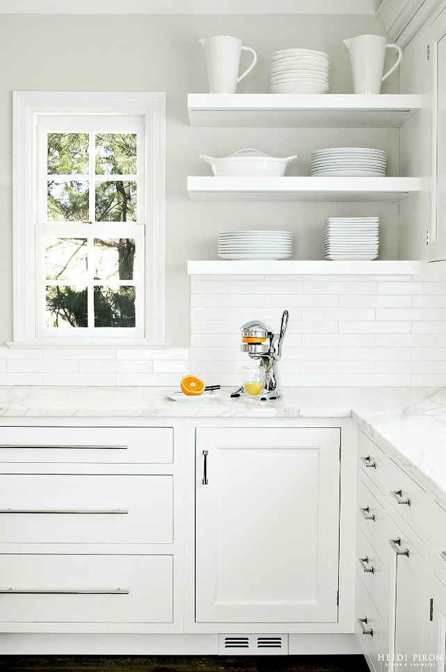 Kitchen Shelves. Kitchen Floating Shelves. The kitchen floating shelves and the longer 2-inch. by 12-inch rectangular tile instead of standard subway tile add to the simple, clean and modern look to the kitchen. #Shelves #KitchenShelves #FloatingShelves #Kitchen Heidi Piron Design