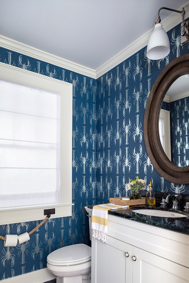 Powder room. Powder room ideas. Powder room with Lobby Wallpaper, Goldfinger. Powder room with custom made metallic and blue lobster wallpaper. Reclaimed wood mirror, and rope as toilet paper holder. Mirror is from Wisteria. #powderRoom #LobbyWallpaperGoldfinger