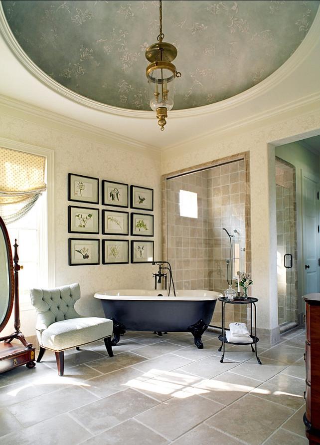 Traditional Bathroom Design. This traditional French Bathroom is gorgeous! I Love the limestone flooring, picture frames and ceiling design. #Bathroom #BathroomDesign #FrenchInteriors 