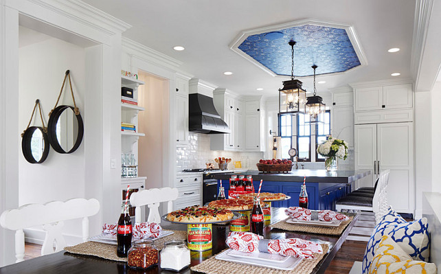 Blue and White Kitchen. Navy Blue and white Kitchen. White kitchen cabinet paint color is Benjamin Moore White Dove. Navy Blue kitchen island paint color is Benjamin Moore Down Pour Blue. Martha O'Hara Interiors. 