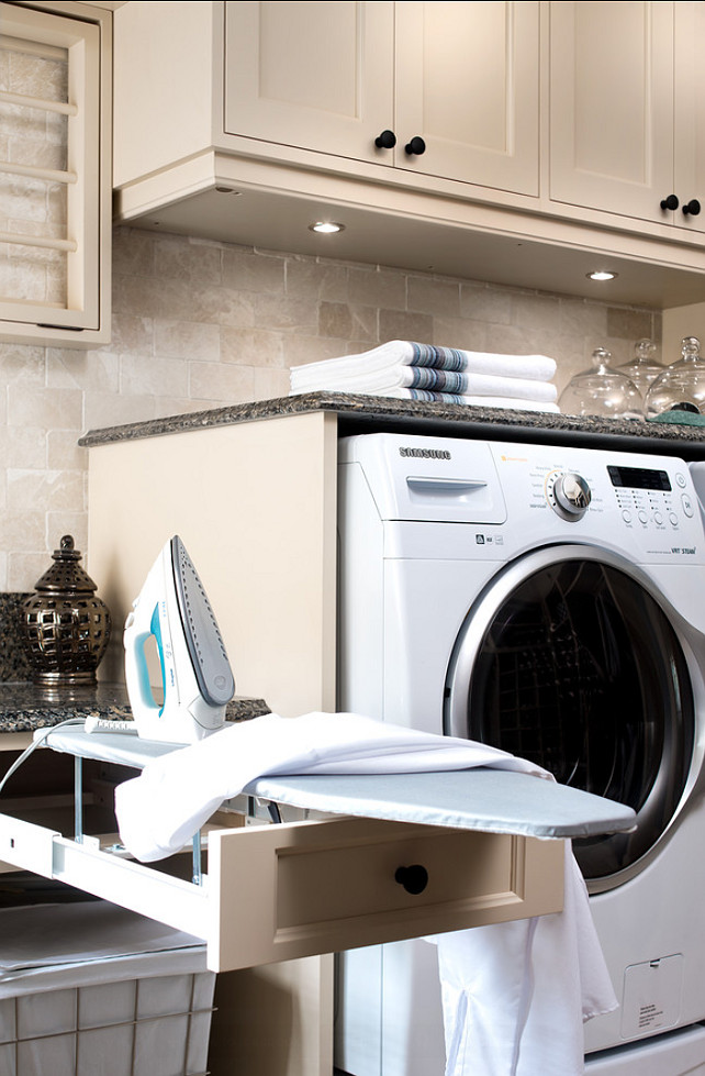 Laundry Room Design Ideas. This laundry room has very smart ideas, like this built-in iron board. #LaundryRoom #Storage #Cabinets