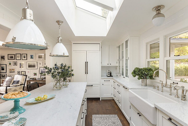 White Kitchen with Stacked Cabinets and Grey Island - Home Bunch