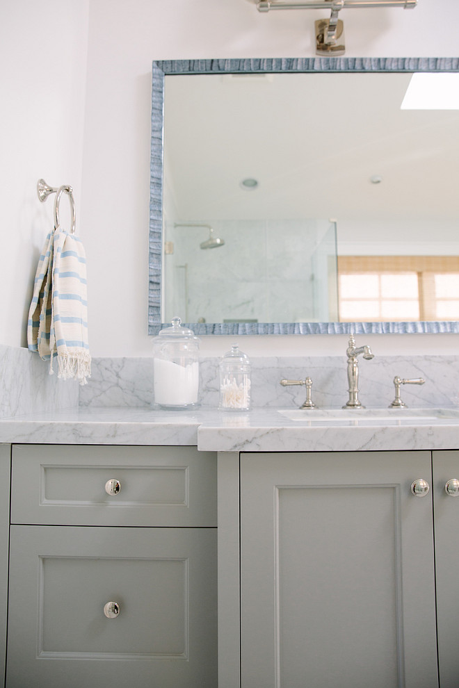 Gray bathroom vanity with marble countertop. Classic Gray bathroom vanity with marble countertop. Gray bathroom vanity with marble countertop ideas. Gray bathroom vanity with marble countertop paint color. Towel is from John Robshaw. #Graybathroomvanity #marblecountertop Rita Chan Interiors. 
