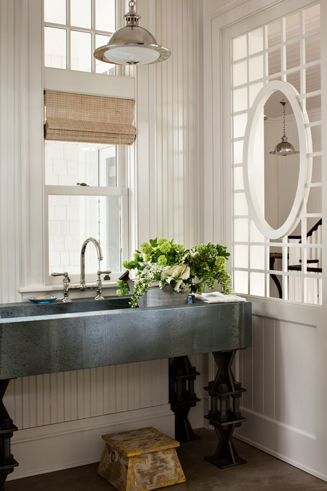 Basin. Laundry Room Basin. Laundry room with zinc basin sink and bridge faucet. #Basin #LaundryRoom #Sink #Zinc #BridgeFaucet Wade Weissmann Architecture.