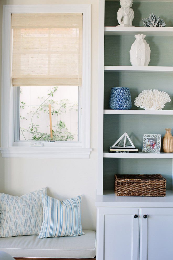 Bookcase Grasscloth Wallpaper. Living room built-in bookcase with grasscloth wallpaper and window-seat. #Bookcase #Grassclothwallpaper Rita Chan Interiors.