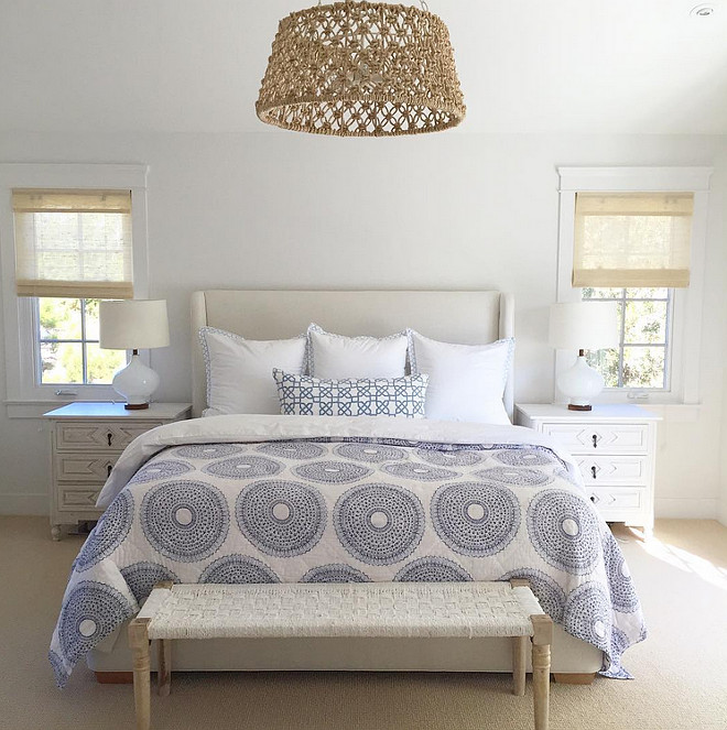 Coastal Bedroom with blue and white bedding by John Robshaw. Woven chandelier is by Made Goods. #Bedroom #CoastalBedroom #MadeGoods #Lighting #WovenChandelier #Wovenlighting Rita Chan Interiors.