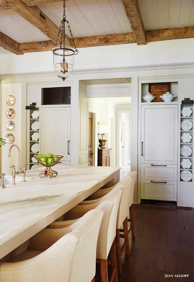 French Country Kitchen. French Country Kitchen with beamed ceiling and Calcutta gold marble countertop. #FrenchCountry #Kitchen #BeamedCeiling #CalcuttaGold #Marble Cyndy Cantley.