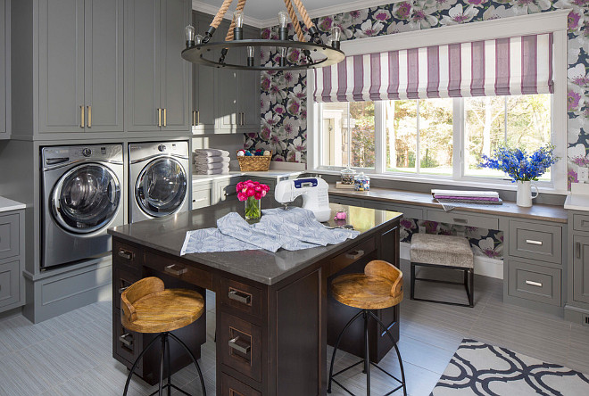 Craft Room Laundry Room Sewing Room. I can see myself spending hours in this craftroom/laundry room/ sewing room. How multitasking is this space, right? The gray cabinet paint color is The cabinet paint color is Sherwin Williams SW0077 Classic French Gray. Floors are 12" x 24" gray ceramic tile. Island countertop is concrete and perimeter counters are Silestone Kensho. The cabinet paint color is Sherwin Williams SW0077 Classic French Gray. Martha O'Hara Interiors.