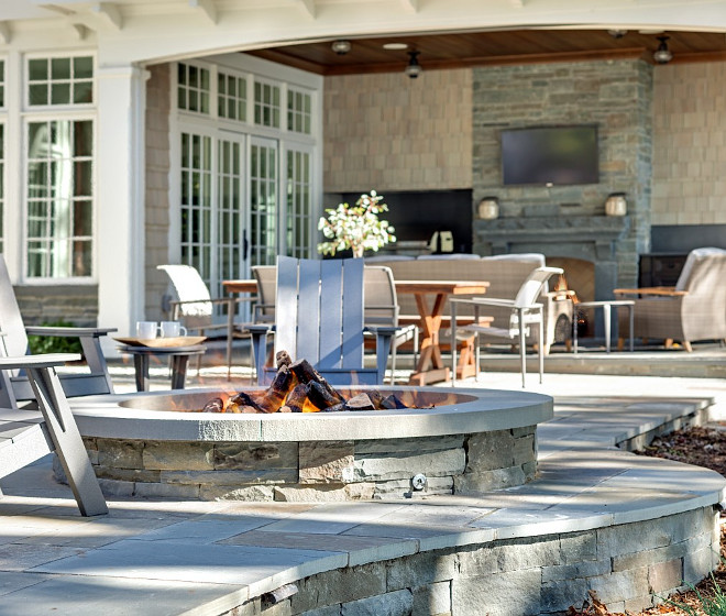 Fire pit. Backyard with fire pit. Built in fire pit. Stone Built in Fire pit ideas. Bluestone Built in Fire pit #firepit #stone #Builtinfirepit #backyard John Kraemer & Sons.