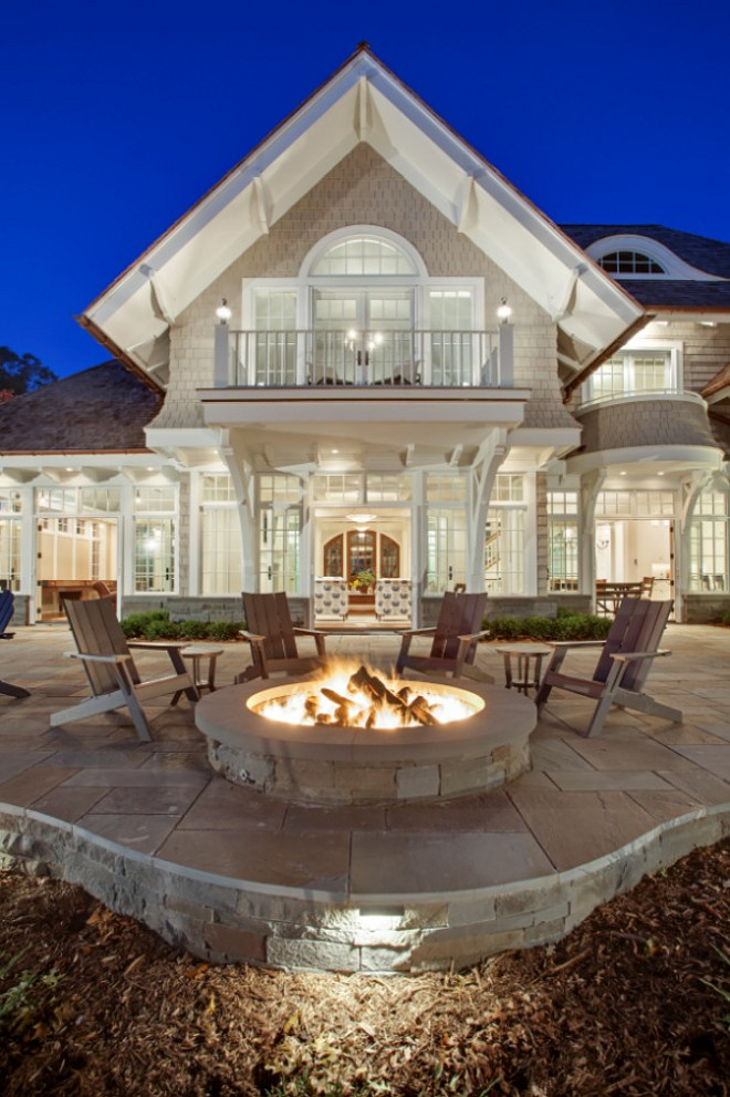 Fire pit. Coastal home with fire pit. John Kraemer & Sons.