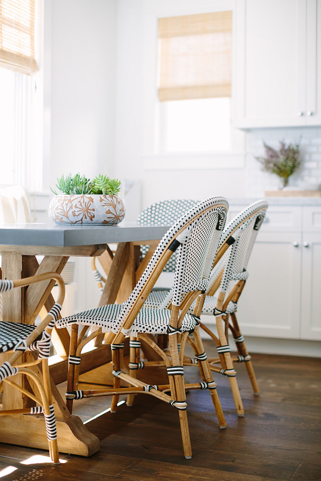 French Bistro Riviera Chairs by Serena and Lily. The trestle table with zinc top was designed by the interior designer and custom-made by Big Daddy's Antiques. Kitchen with French Bistro Riviera Chairs by Serena and Lily. #FrenchBistroRivieraChairs #SerenaandLily Rita Chan Interiors.