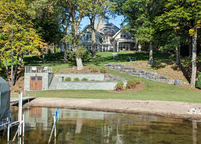 Lake House Dock with shed by lake to store boat equipment. #Lakehouse #dock #Shed #Boat #equipmentJohn Kraemer & Sons.