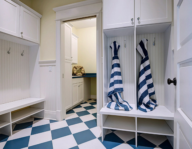 Mudroom. Beach house mudroom with blue and white decor. Beach house mudroom with blue and white checkered floors. #Mudroom #Beachhouse #Blueandwhite Grand Estates Auction Company.