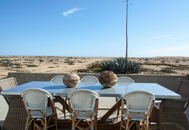 Outdoor Zinc Table. Patio with outdoor dining zinc table and wicker chairs. #ZincTable Blackband Design.