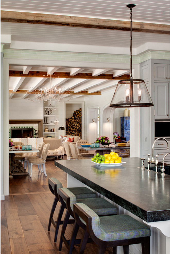 Soapstone kitchen island. Soapstone kitchen island countertop. White kitchen with soapstone countertop. #Soapstone #Countertop #kitchen Wade Weissmann Architecture. David Bader Photography.